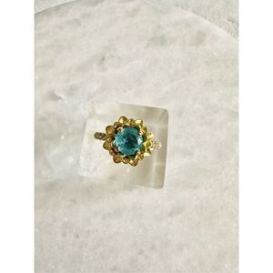 Light blue and gold lotus ring ￼